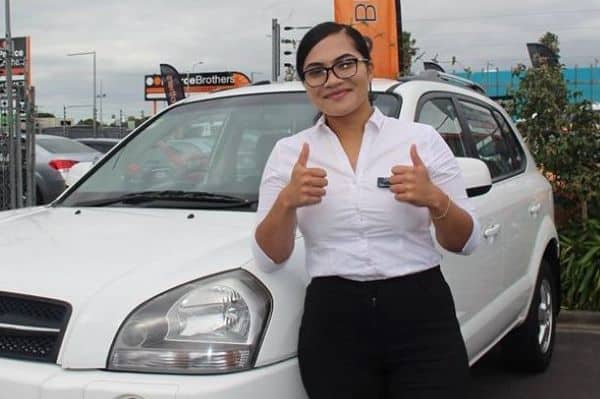 Kamela with her car