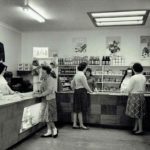 Sisters working in a shop with girls
