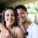 Portrait of Young Lesbian Couple at Subway Station