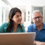 Mature couple controling home finances