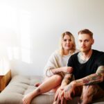 Portrait of a young couple relaxing at home