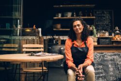 Portrait of a confident mature woman working in a coffee shop